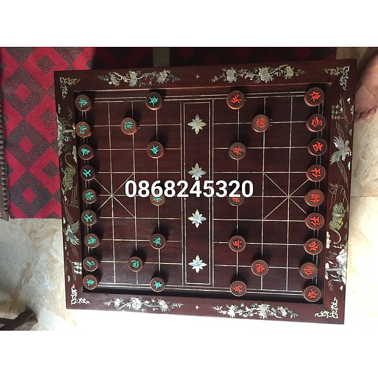 Combo Bàn cờ tướng gỗ gõ khảm ốc kết hợp vỏ bào ngư xanh đỏ +quân cờ gỗ trắc kt 4.5×1.5cm đẹp long lanh